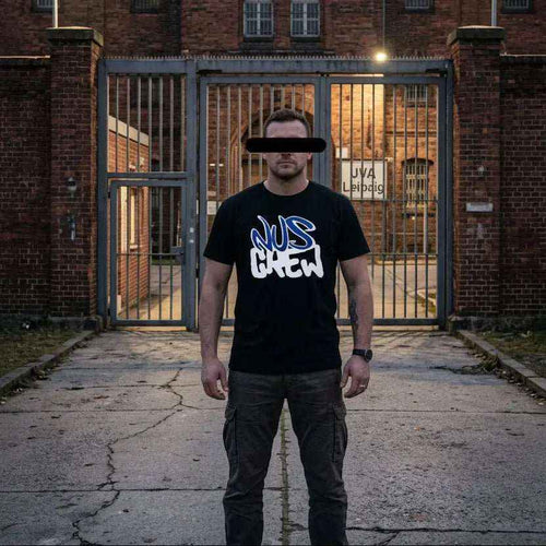 Schwarzes Graffiti T-Shirt „Hinter Gittern trennt sich Freund und Feind“