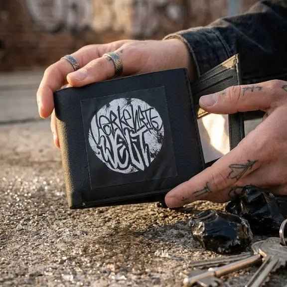 Graphic Wallet featuring unique artwork and a sleek black design, perfect for everyday use.